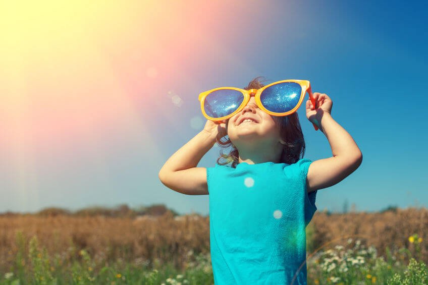 kid with large sunglasses